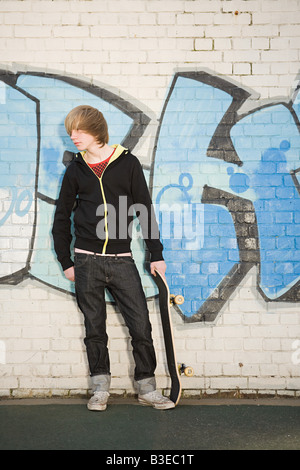 Junge mit skateboard Stockfoto