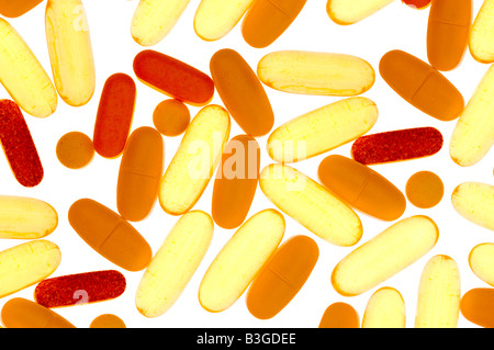 Verschiedene Vitamine auf weiße Fläche Stockfoto