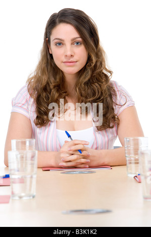 Geschäftsfrau, die sitzen im Sitzungssaal Stockfoto