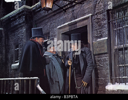 SCROOGE 1970 Zentrum Kinofilm mit Albert Finney auf der rechten Seite Stockfoto