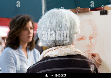 Maler auf einem Platz im Viertel Montmartre in Paris, Frankreich Stockfoto