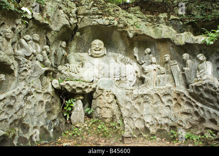 China, Hangzhou, Linyin Kloster, lachender Buddha Skulptur Stockfoto