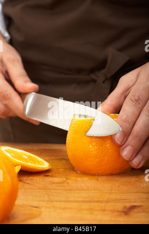 Filetieren Orangen, close-up Stockfoto