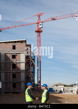 Ingenieure, die Hände schütteln Stockfoto