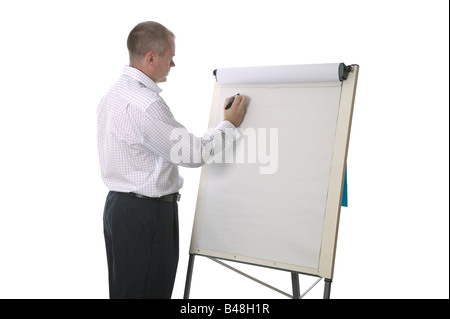 Geschäftsmann hält einen Vortrag zu schreiben auf einem Flip-Chart, die für Ihren eigenen Text leer ist Stockfoto