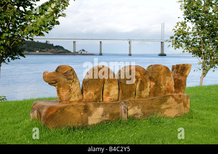 Chainsaw Holzskulptur von "Nessie" Ungeheuer von Loch Ness bei Merkinch Inverness. Stockfoto