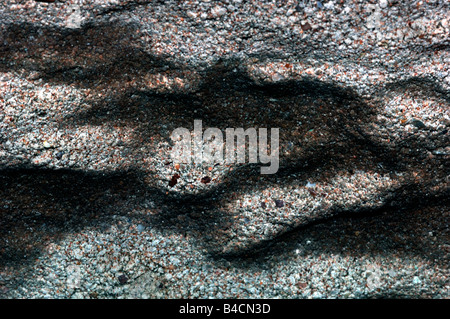 Schatten auf eine Brise Blockwand Stockfoto