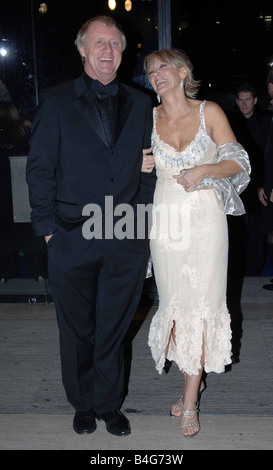 Quiz-Show-host Chris Tarrant ankommen in der Royal Albert Hall für The National TV Awards mit Frau Oktober 2005 Stockfoto