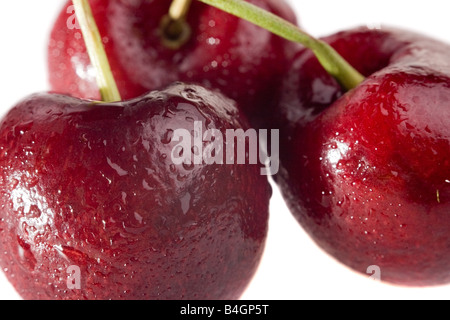 drei rote Kirschen Stockfoto