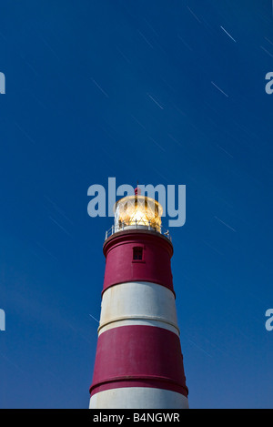 Happisburgh Leuchtturm fotografiert nachts während einer Langzeitbelichtung an der Küste von Norfolk Stockfoto