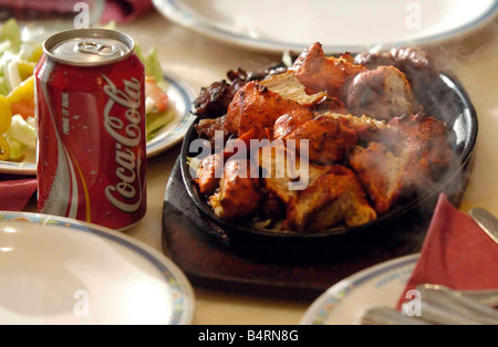 Birmingham-Balti-Gürtel, das getroffen wurde durch die jüngsten Tornado die Nachricht ist, sie sind geöffnet und servieren gutes Essen Bild an der Straße von Lahore Kebab Haus Ladypool August 2005 Stockfoto