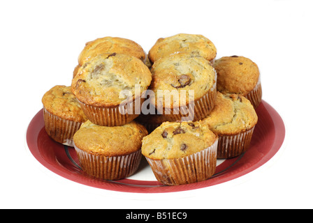 Muffins auf einem Teller isoliert auf weiss Stockfoto