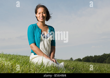 Frau in einem Feld Stockfoto