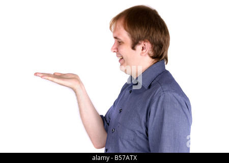 Junger Mann, Blick auf etwas überraschend an der hand Stockfoto