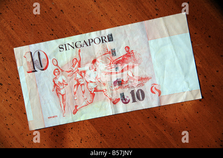 Singapur 10-Dollar-Banknote auf Tisch Stockfoto