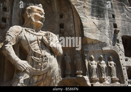 Geschnitzten Buddha-Statuen in Longmen Grotten, Dragon Gate Grotten, Provinz Henan, China Stockfoto