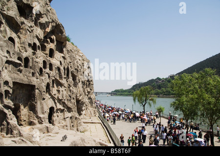 Geschnitzten Buddha-Figuren, Longmen Grotten, Dragon Gate Grotten zum Yi er Fluss, Henan Provinz, China Stockfoto