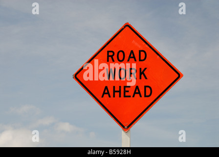 Straßenschild Arbeit vor Stockfoto