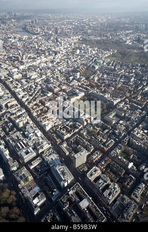 Luftbild Süd-Osten von Oxford Street Grosvenor Square innerstädtischen Gebäude Mayfair Soho Green Park Fluss Themse London W1 SW1 Stockfoto