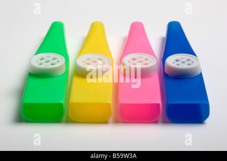 Vier Kazoos Stockfoto