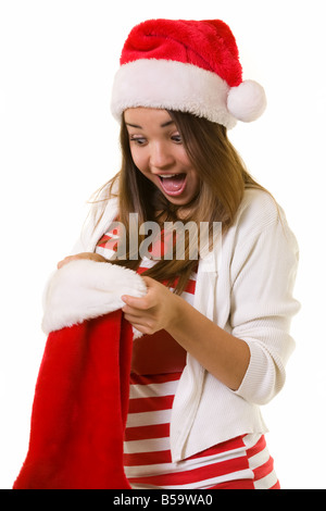 Überraschung in einem Weihnachts-Strumpf Stockfoto