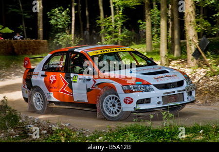 2004-Mitsubishi Lancer EVO-lX mit Geoff Underhill Fahrer auf der Waldbühne beim Goodwood Festival of Speed, Sussex, UK. Stockfoto