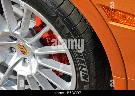 Palm Desert CA Cayenne GTS auto 2009 spätes Modell, was burnt orange Porsche Gärten auf El Paseo fahren Rad hautnah Stockfoto