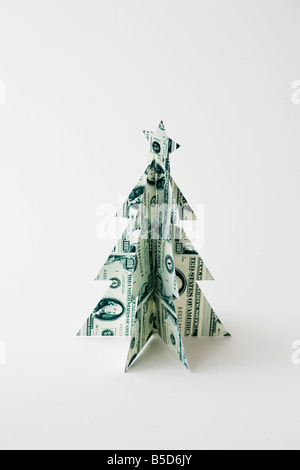 Weihnachtsbaum gemacht Geld Urlaub Ausgaben Kosten sparen Stockfoto