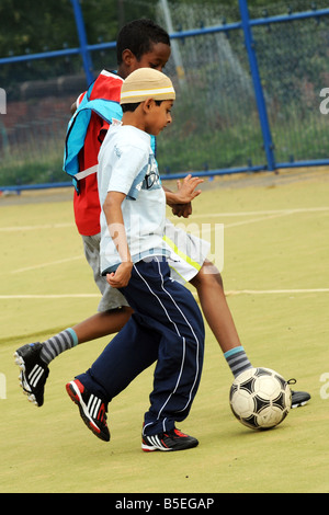 Fußballtraining mit Bolton Wonderers für einheimische Kinder, Bolton, größere Manchester, UK Stockfoto