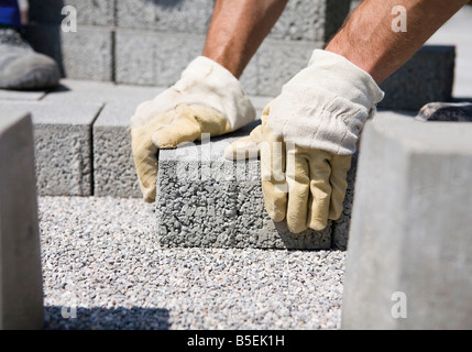 Bau Arbeiter Einstellung Pflasterstein Stockfoto
