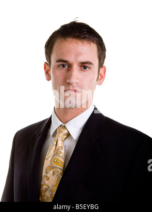 Ernste aussehende junge Geschäftsmann auf weiß Stockfoto