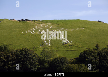 Der Riese von Cerne liegt auf einem Hügel über dem Dorf von Cerne Abbas. Stockfoto