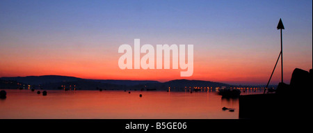 Sonnenuntergang über der Mündung des Flusses Exe in Exmouth, Devon, UK Stockfoto