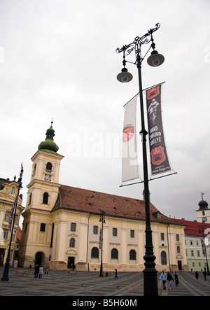 Werbung auf einen Laternenpfahl, römisch-katholische Kirche, Piata Mare, großen Platz, Sibiu, Siebenbürgen, Rumänien Stockfoto