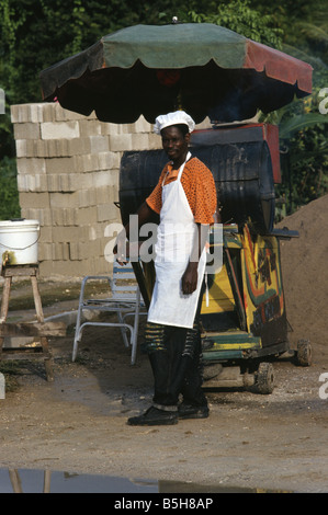 Essen-Anbieter auf der Straße in Negril Jamaika Jerk Chicken zu verkaufen Stockfoto