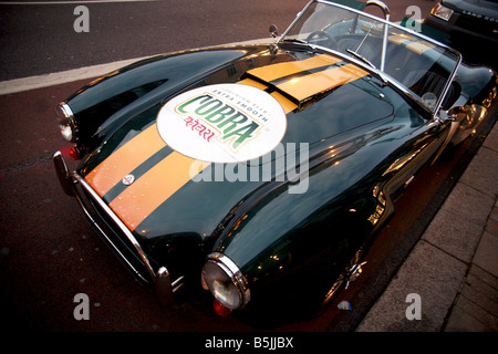 AC Cobra Sportwagen Förderung indisches Bier Cobra London Stockfoto