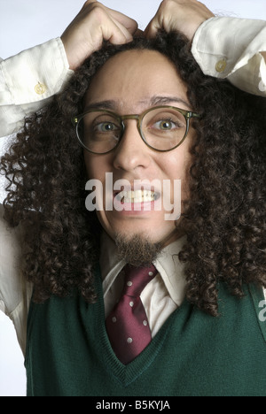 Mann mit zottigen Haaren in formelle Kleidung. Stockfoto