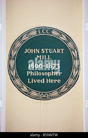 London Grafschaftsrat Plakette markiert eine ehemalige Wohnhaus des Philosophen John Stuart Mill in Kensington Square in London, England Stockfoto