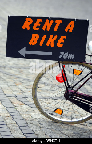 Mieten Sie ein Fahrrad-Zeichen Stockfoto