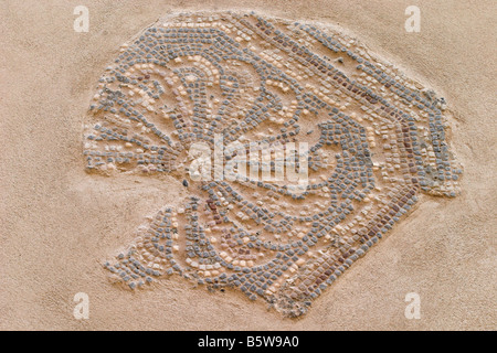 Nahaufnahme eines Mosaiks in der archäologischen Stätte Kourion, Zypern. Ein UNESCO-Weltkulturerbe Stockfoto