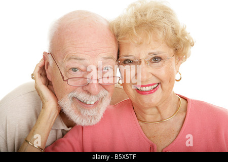 Attraktives älteres Paar in modernen modischen Brille Teil meiner optischen Serie isoliert auf weiß Stockfoto