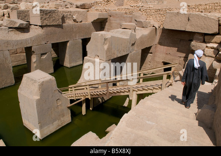 Monolithische Blöcke des Osirion oder Osireon alten ägyptischen Tempels auf der Rückseite des Tempels von Seti I in Abydos Tempelkomplex Ägypten Stockfoto