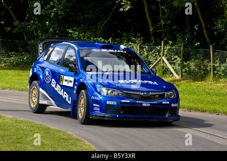 2008 Subaru Impreza WRC Prodrive mit Fahrer Petter Solberg beim Goodwood Festival of Speed, Sussex, UK. Stockfoto