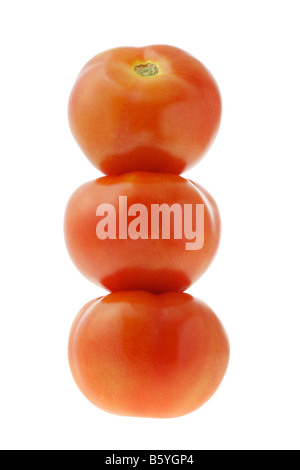 Stapel von drei Tomaten auf weißem Hintergrund Stockfoto