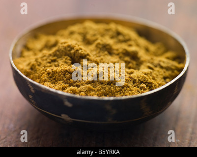 Schüssel mit Kreuzkümmel, gemahlen Stockfoto