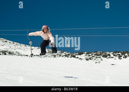 Springen Snowboarder am Turoa Skipisten, Ruapehu, Tongariro National Park, Neuseeland Stockfoto