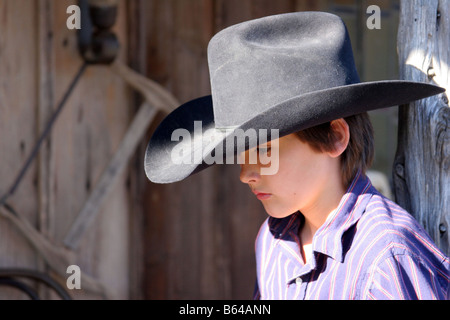 Ein junger Cowboy auf der Ranch im wilden Westen Stockfoto