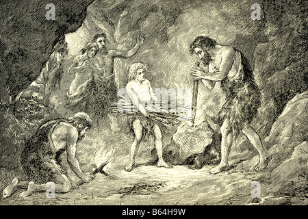 Primitive Menschen machen Feuer im Quartär. Antike Darstellung. 1924. Stockfoto