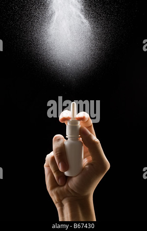 Nasalen Spray besprühen Stockfoto