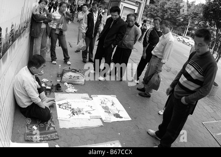 Der chinesischen Unterschicht Kampf für Arbeit täglich als globale Wirtschaftskrisen weitet sich bei steigender Arbeitslosigkeit und Einkommensgefälle erweitert Stockfoto